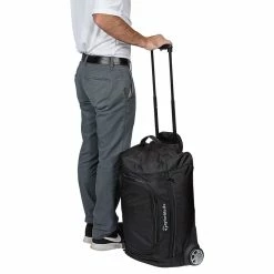 TaylorMade Performance Golf Rolling Carry On Bag -Deals Golf Headcovers Store taylormade 2020 performance rolling carry on bag person holding
